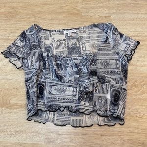 Topshop mesh newspaper astrology print top
